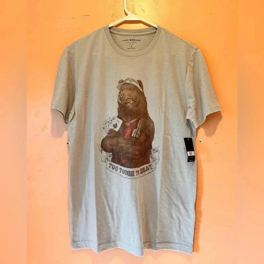 Men's size small Lucky Brand T-shirt. "Too Tough To Beat". Brand New with Tags!